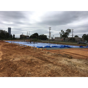 Vapor barrier installation pre-slab.